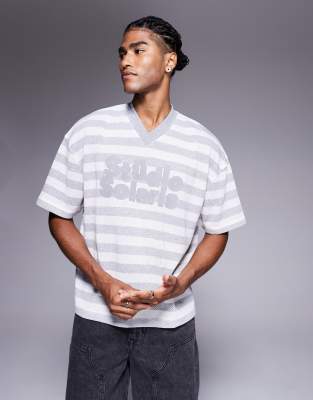 ASOS DESIGN boxy oversized T-shirt with v-neck and text graphic in textured stripe-Multi
