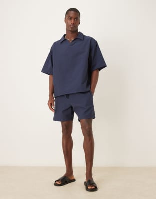 Asos Design Boxy Oversized Textured Polo Shirt In Blue