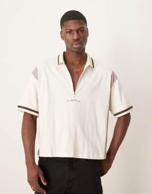 Asos Design Boxy Oversized Zipped Polo Shirt With Cut And Sew Paneling And Text Graphic In White
