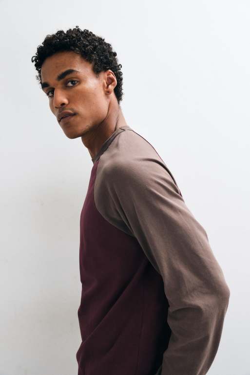 ASOS DESIGN boxy relaxed long sleeve raglan t-shirt in washed burgundy, 4 of 5