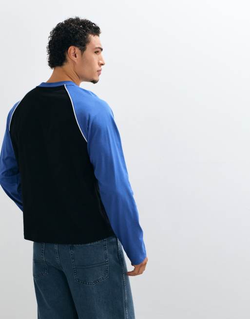 ASOS DESIGN boxy relaxed long sleeve raglan t-shirt with sports print in blue, 5 of 5