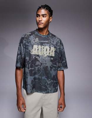 ASOS DESIGN boxy relaxed T-shirt with text graphic in camo print - view 1