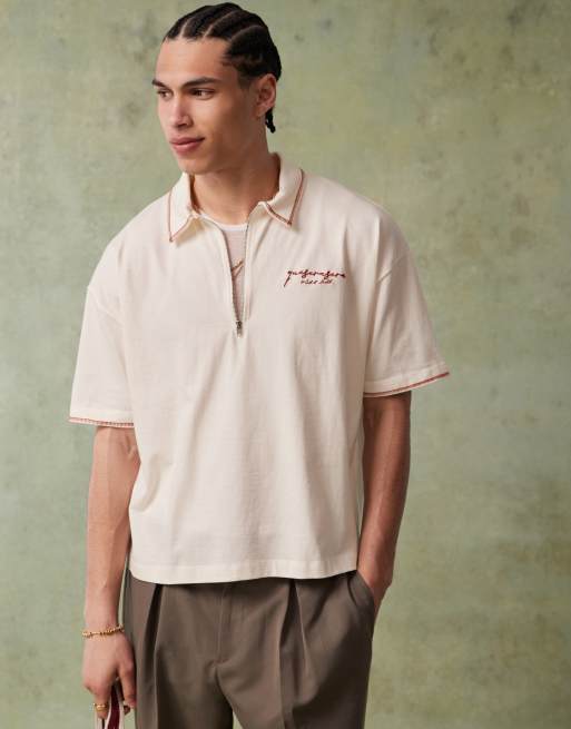 ASOS DESIGN boxy short sleeve polo shirt with chest embroidery and back graphics in off white