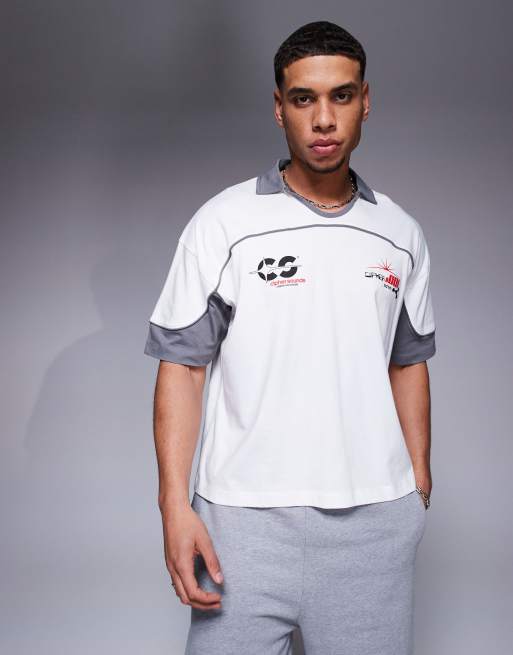 ASOS DESIGN boxy short sleeve polo shirt with city print in brown