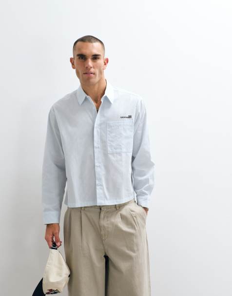 ASOS DESIGN boxy striped shirt with placement embroidery in blue - view 1
