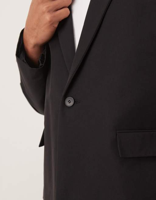 ASOS DESIGN boxy suit jacket in casual black tech fabric