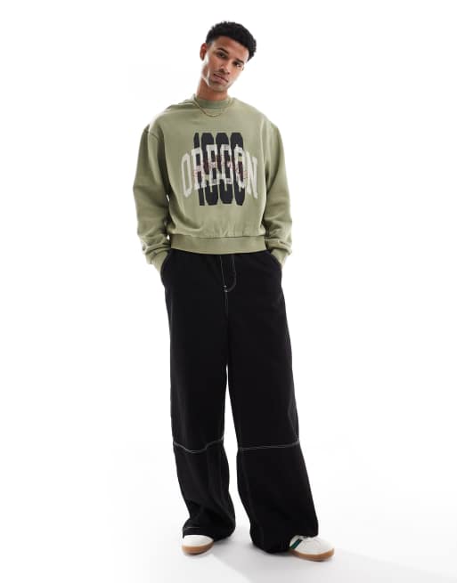 ASOS DESIGN boxy sweatshirt with acid wash and layered print in green, 4 of 4
