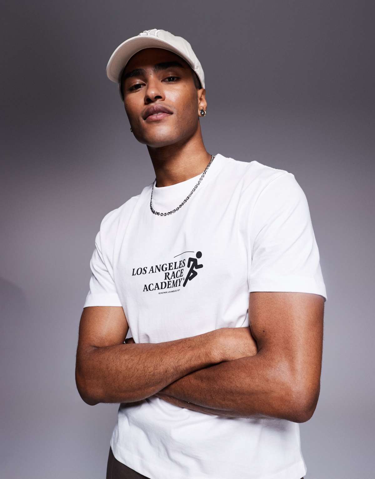 ASOS DESIGN boxy t-shirt with sports graphic in white