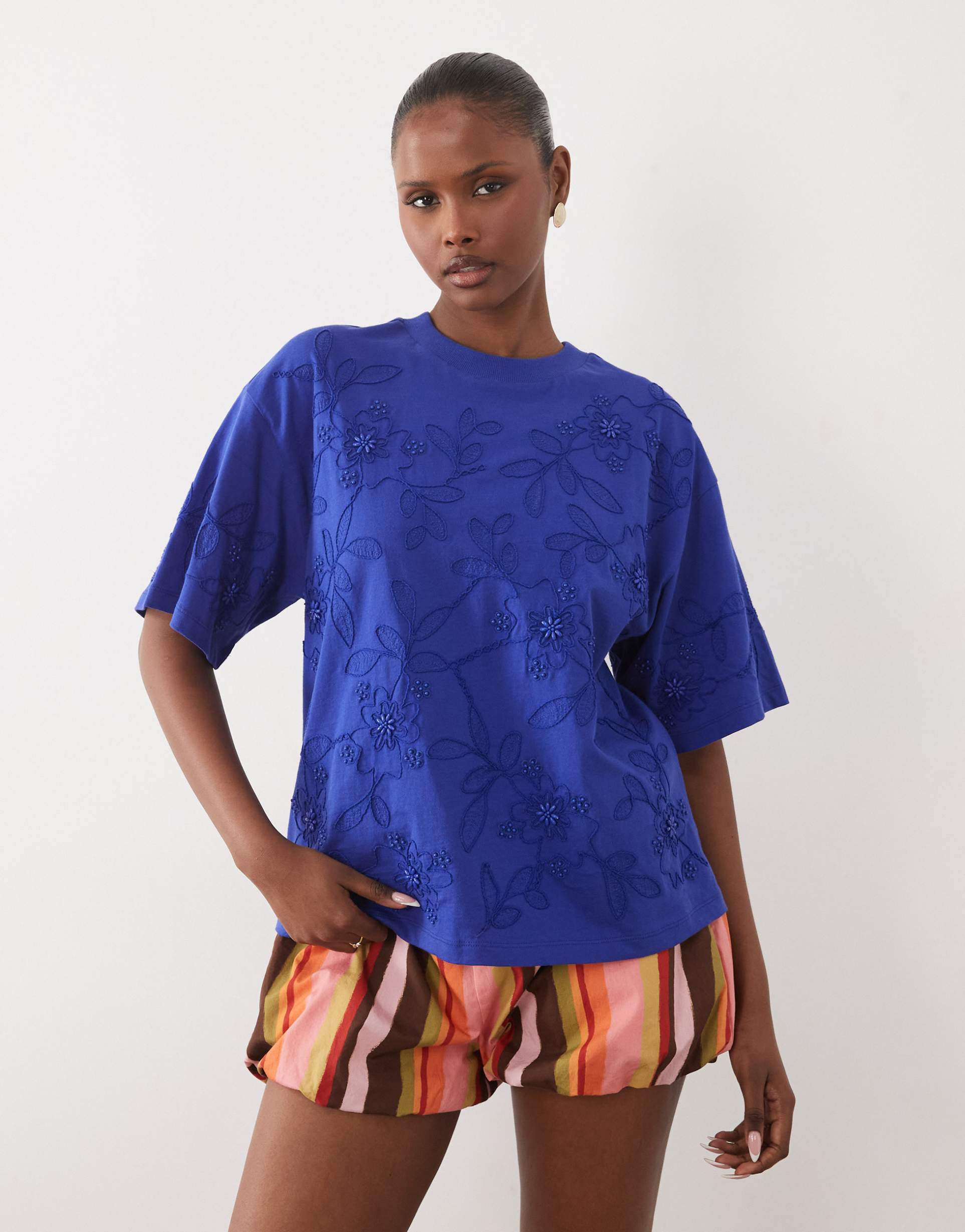 asos design boxy tee with embroidered flowers in blue