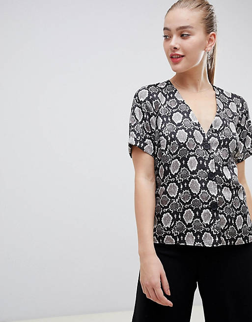 ASOS DESIGN boxy top with contrast buttons in snake animal print