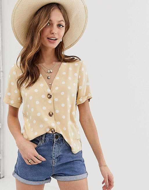 ASOS DESIGN boxy top with contrast buttons in spot print