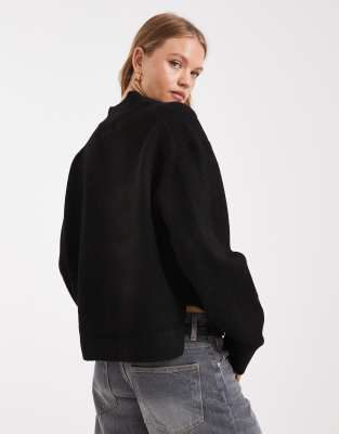 ASOS DESIGN boxy V-neck sweater with side slit detail in