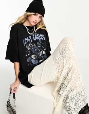 ASOS DESIGN - Boyfriend-T-Shirt in Schwarz mit „Lost Eagles"-Grafikprint im Rock-Design