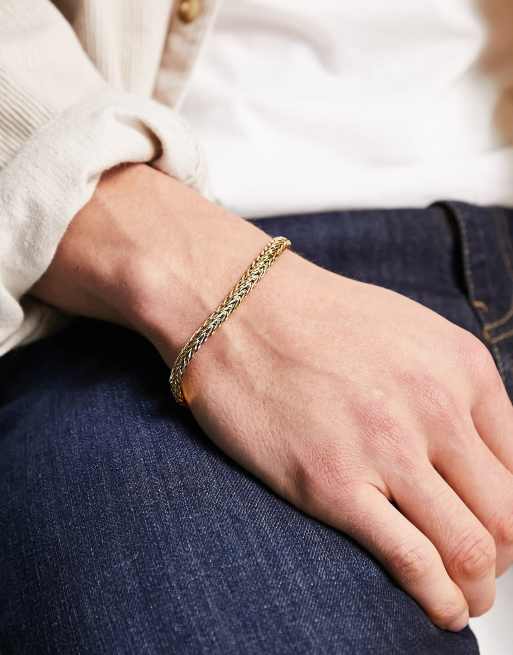 ASOS DESIGN - Bracciale a catenina piatta in acciaio inossidabile resistente all'acqua color oro