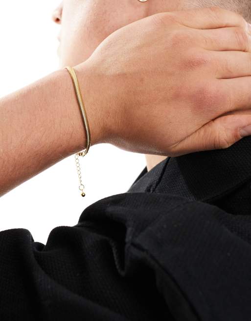 ASOS DESIGN - Bracciale a catenina piatta in acciaio inossidabile resistente all'acqua color oro