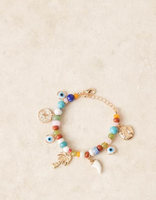 ASOS DESIGN - Bracciale color oro con ciondoli e perline, 2 di 3