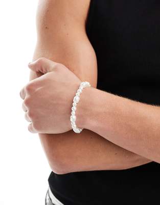 ASOS DESIGN - Bracciale con perle sintetiche irregolari bianche e barretta a T