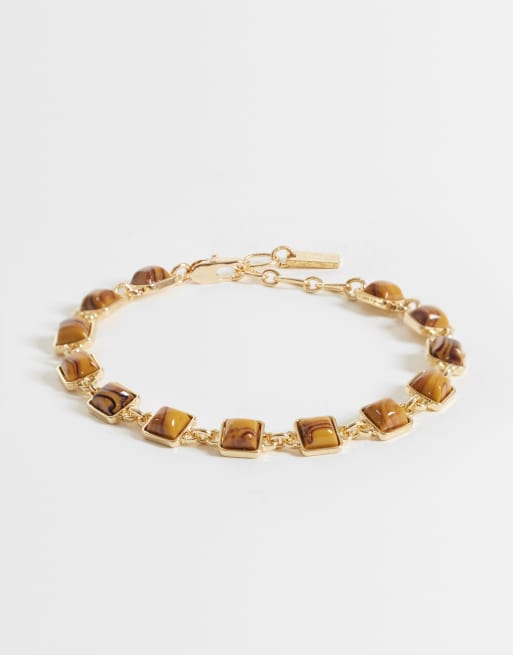ASOS DESIGN bracciale con pietre effetto occhio di tigre color oro, 1 di 3