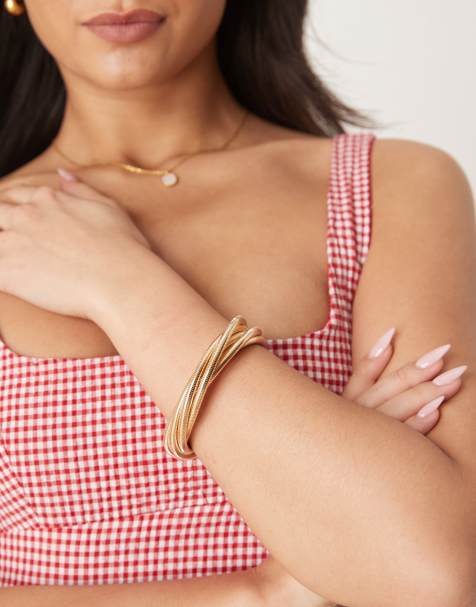 ASOS DESIGN - Bracciale dorato con design attorcigliato elasticizzato - view 1