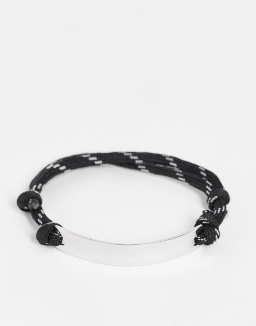 ASOS DESIGN - Bracciale in corda nera con targhetta in metallo stile festival  