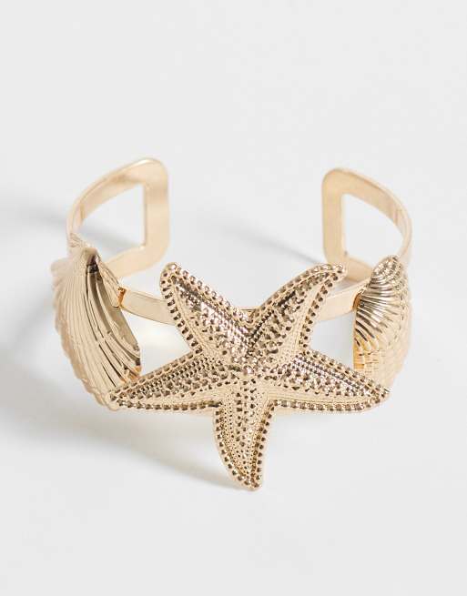 ASOS DESIGN - Bracciale rigido color oro a tema marino