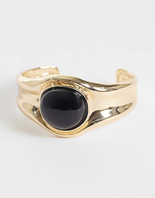 ASOS DESIGN bracciale rigido color oro con pietra nera incastonata, 1 di 3