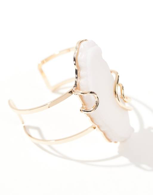 ASOS DESIGN - Bracciale rigido dorato con frammento in pietra semipreziosa sintetica