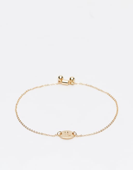ASOS DESIGN - Braccialetto dell'amicizia color oro con simbolo del capricorno