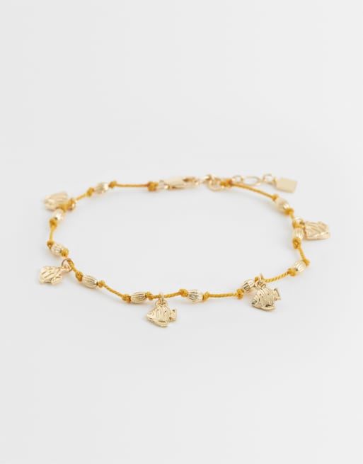 ASOS DESIGN - Bracelet de cheville en cordon avec breloques poisson - Orange et doré