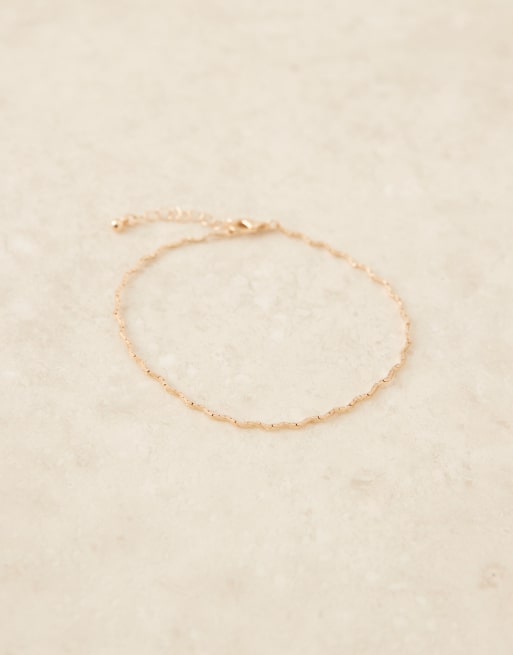 ASOS DESIGN anklet with wiggle detail in gold tone
