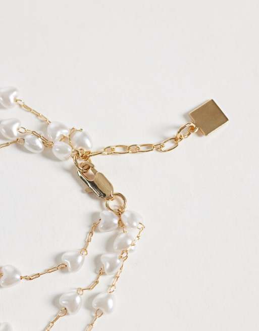 ASOS DESIGN - Bracelet délicat multi-rangs avec chaînes et cœurs en fausses perles - Doré, 3 de 3
