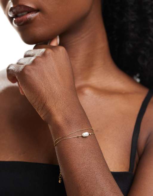 ASOS DESIGN - Bracelet en acier inoxydable à maillons fins et pendentif perle d'eau douce fantaisie - Doré