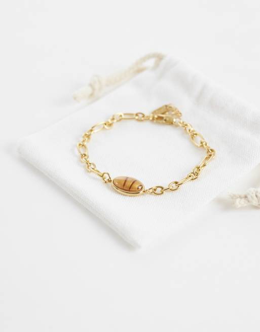 ASOS DESIGN - Bracelet en acier inoxydable résistant à l'eau avec pierre œil-de-tigre ovale - Doré, 3 de 3