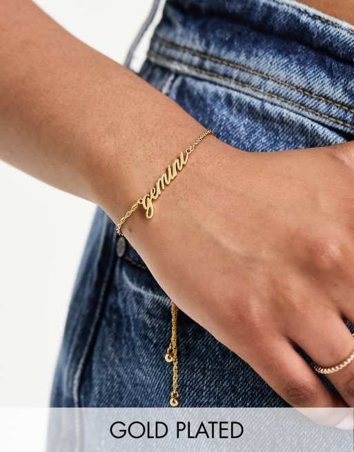 ASOS DESIGN - Bracelet en plaqué or 14 carats avec motif signe du zodiaque Gémeau