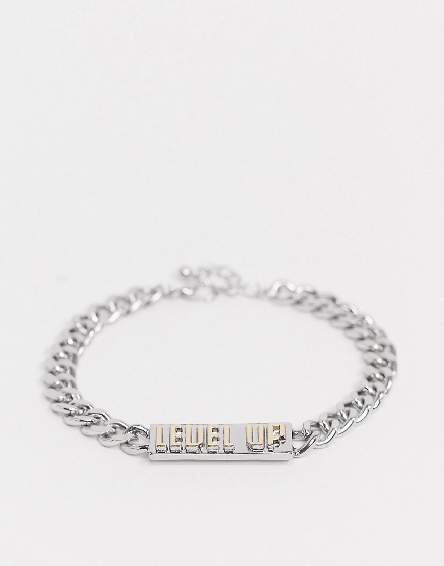 ASOS DESIGN bracelet in silver tone with gold level up motif