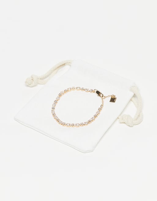 ASOS DESIGN - Bracelet style tennis orné de zircons cubiques avec pochette cadeau - Doré, 2 de 3