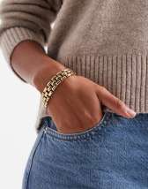 ASOS DESIGN large earring with molten faux-pearl stone setting in gold tone