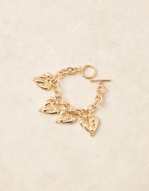 ASOS DESIGN bracelet with heart charms and t-bar in gold tone, 2 of 3