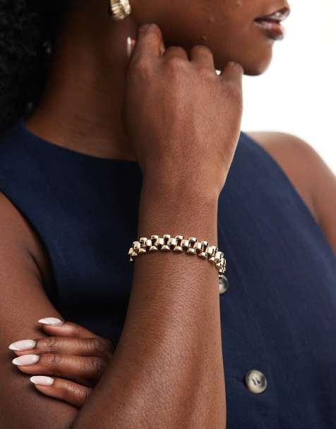 ASOS DESIGN bracelet with watch strap style detail in gold tone - view 1