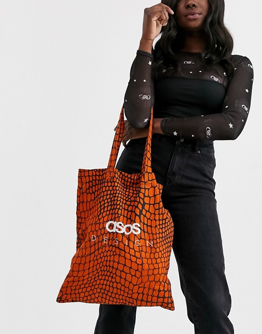 ASOS DESIGN branded organic cotton tote in croc print