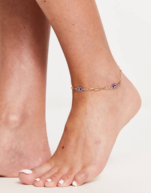 ASOS DESIGN – Bransoletka na kostkę w kolorze złota z niebieskimi zawieszkami z motywem oka