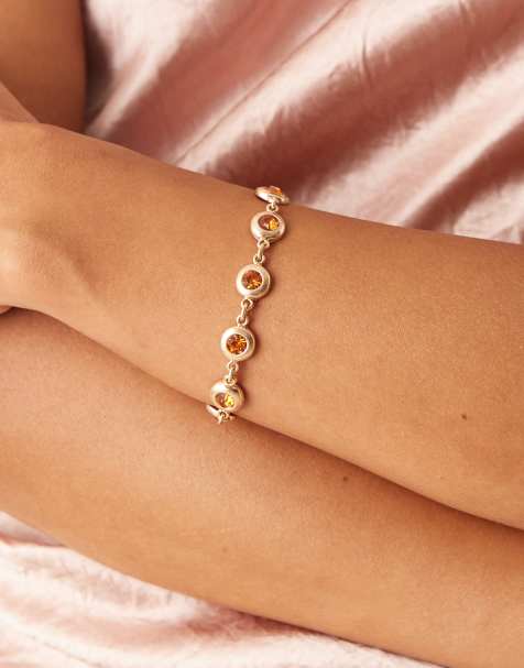 ASOS DESIGN – Bransoletka w odcieniu złota ze sztucznymi bursztynami - view 1