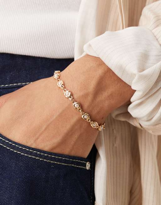 ASOS DESIGN – Bransoletka z motywem stopionej linki w odcieniu złota z perełkami