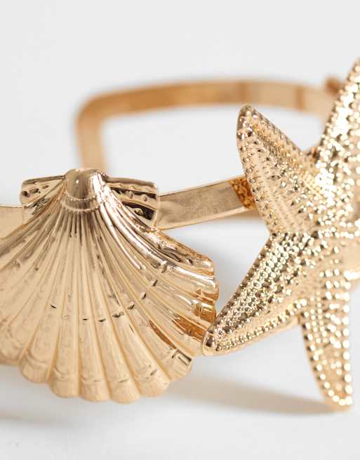 ASOS DESIGN - Brazalete dorado con diseño de adornos marinos, 2 de 3