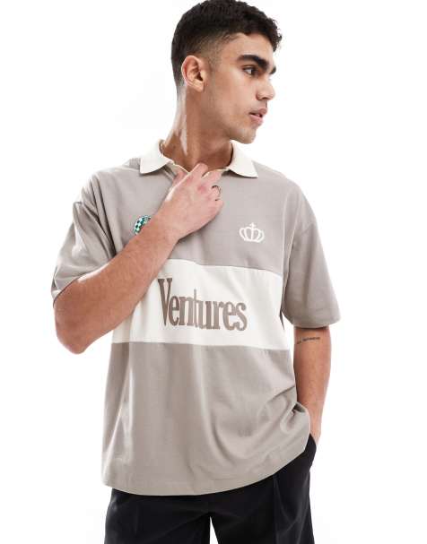ASOS DESIGN oversized polo with cut and sew panelling and text graphic in brown