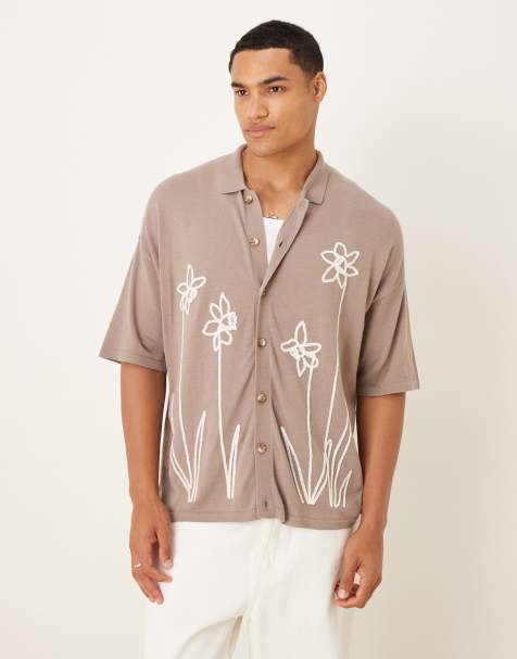 ASOS DESIGN relaxed knitted button through polo with floral pattern in brown