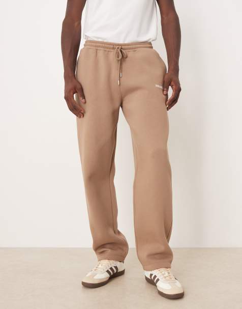 ASOS DESIGN – Brązowe joggersy oversize z nadrukiem - view 1