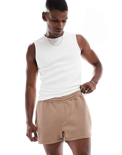 ASOS DESIGN shorter length short with curved hem in brown