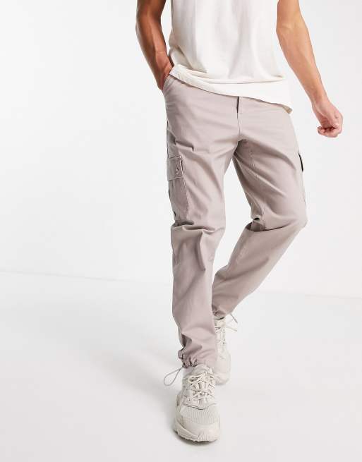 ASOS DESIGN – Brązowe, zwężane bojówki
