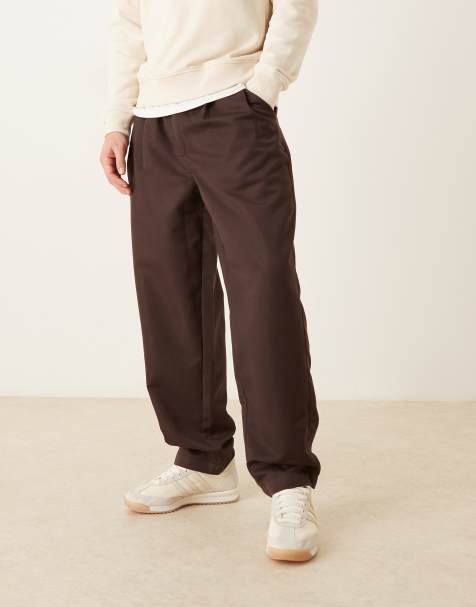 ASOS DESIGN – Brązowe zwężane spodnie oversize z zakładkami - view 1